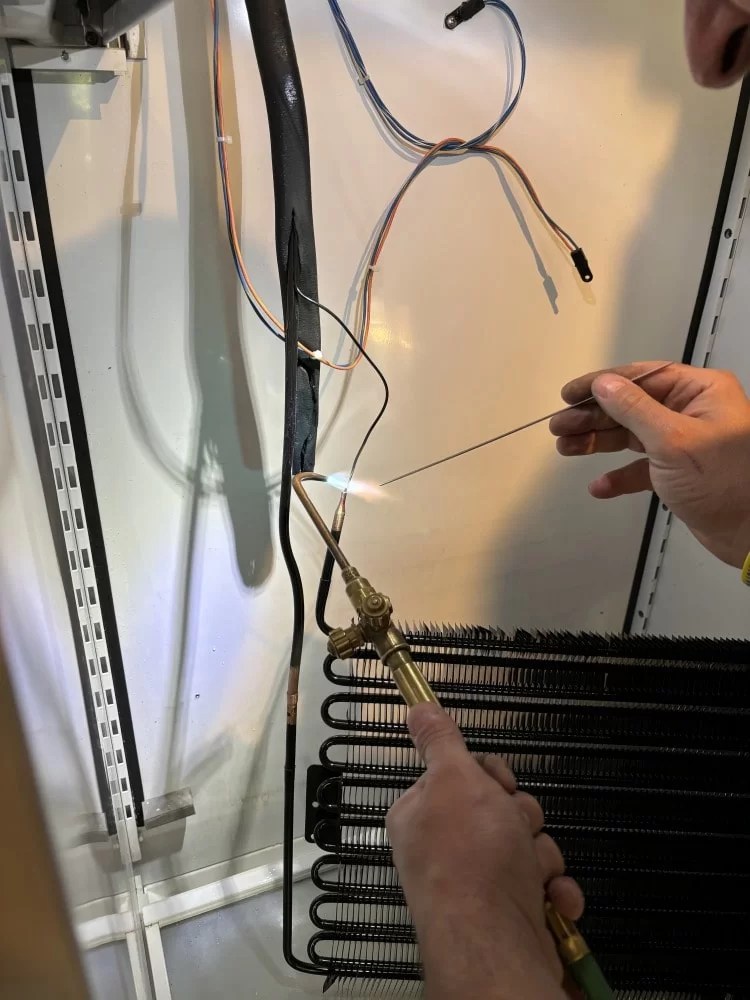 Built-in refrigerator cooling system repair