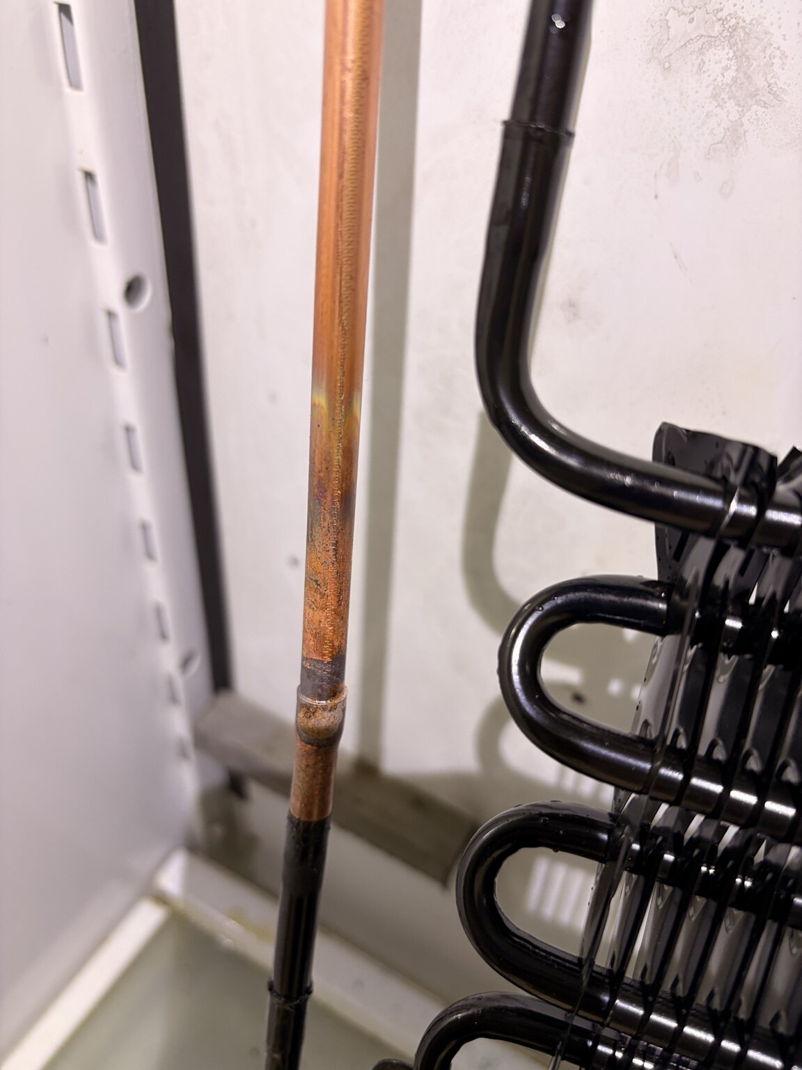 Refrigeration tubing showing a damaged section